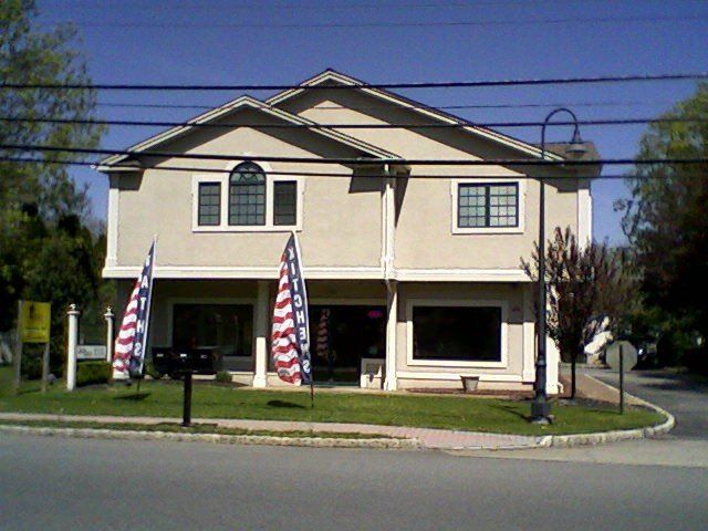 American Flags Infront Of Office — Clifton, NJ — Evergreen Commercial Real Estate Brokers Inc