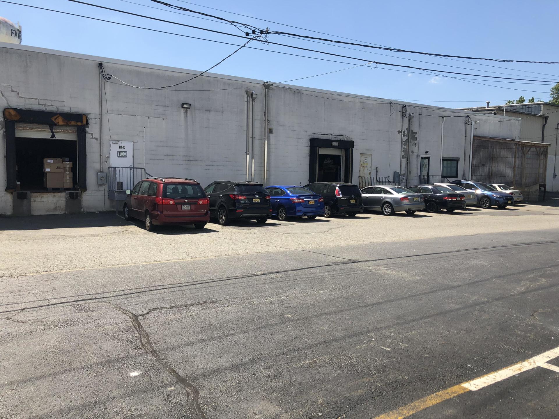 Cars Lined Up On Parking Lot — Clifton, NJ — Evergreen Commercial Real Estate Brokers Inc