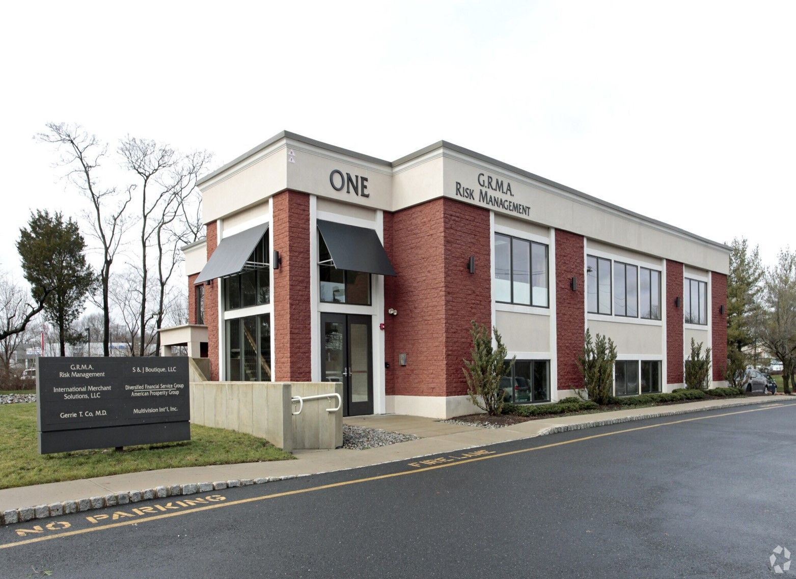 A large brick building with the word one on it