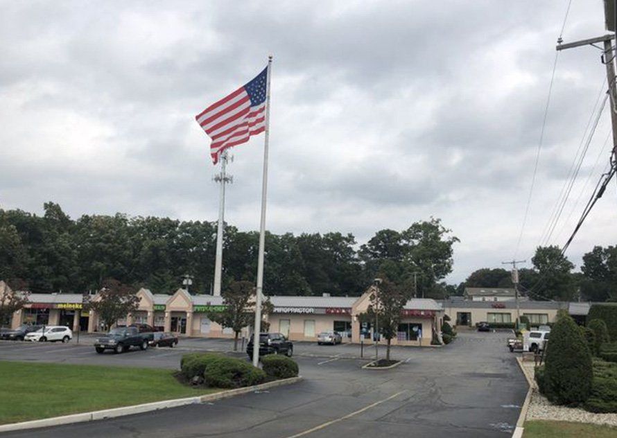 Flag On Commercial  Space — Clifton, NJ — Evergreen Commercial Real Estate Brokers Inc