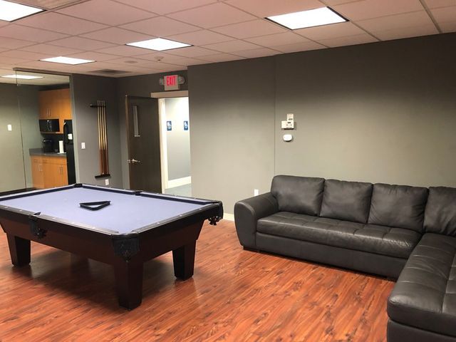 Leather Couch And Pool Table — Clifton, NJ — Evergreen Commercial Real Estate Brokers Inc