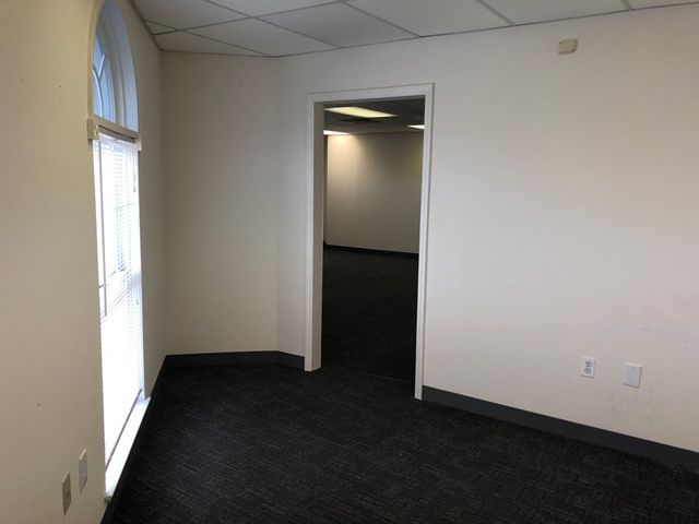 Empty Carpeted Room — Clifton, NJ — Evergreen Commercial Real Estate Brokers Inc