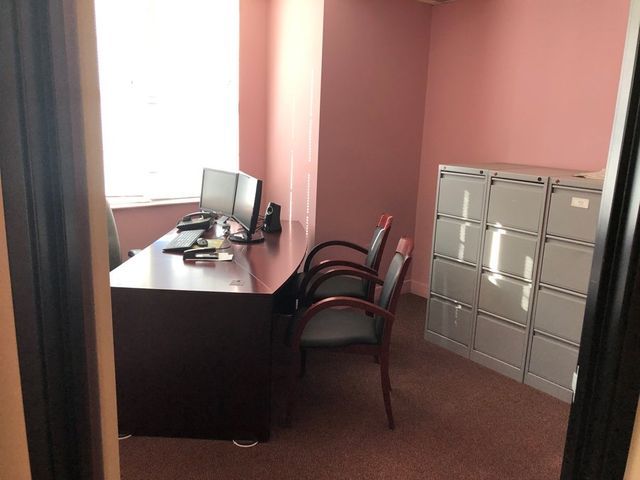 Pink Walled Office With Huge Windows — Clifton, NJ — Evergreen Commercial Real Estate Brokers Inc