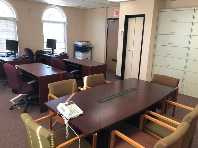 Wooden Desk For Meetings — Clifton, NJ — Evergreen Commercial Real Estate Brokers Inc