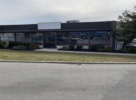 Infront Of Retail Store Building — Clifton, NJ — Evergreen Commercial Real Estate Brokers Inc