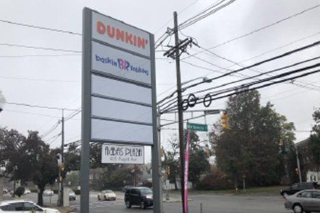 Building Sign Near Electric Post — Clifton, NJ — Evergreen Commercial Real Estate Brokers Inc