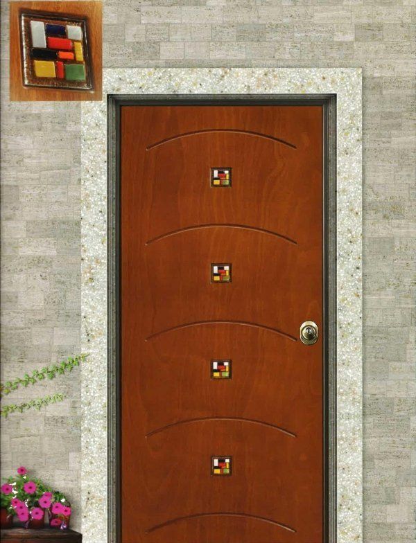 porta blindata in legno e alluminio con pomello in ottone