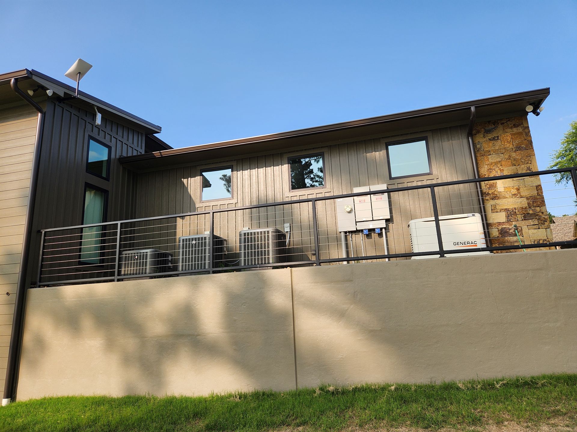 A house with a balcony on the side of it
