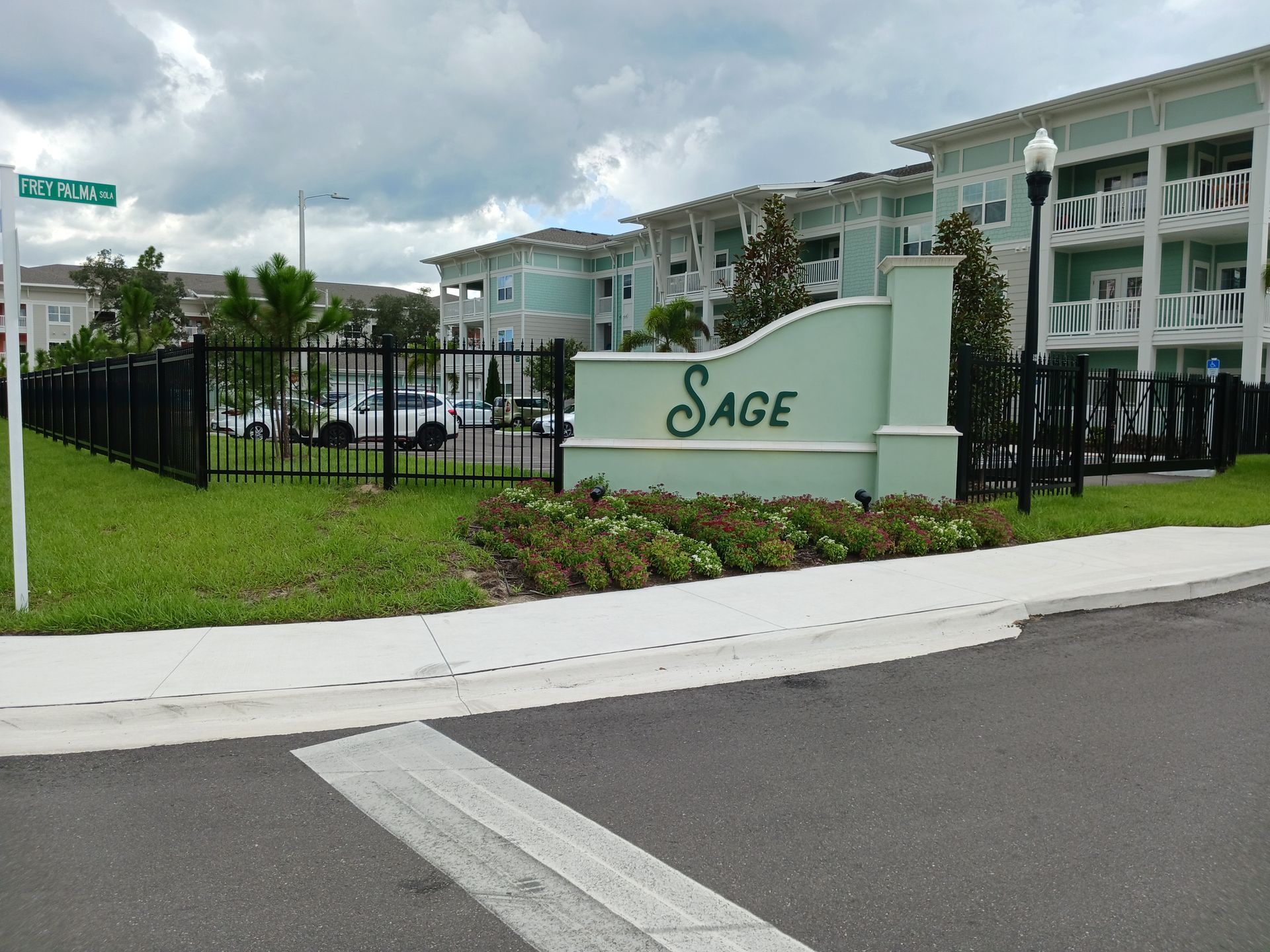 A sign that says sage in front of a building