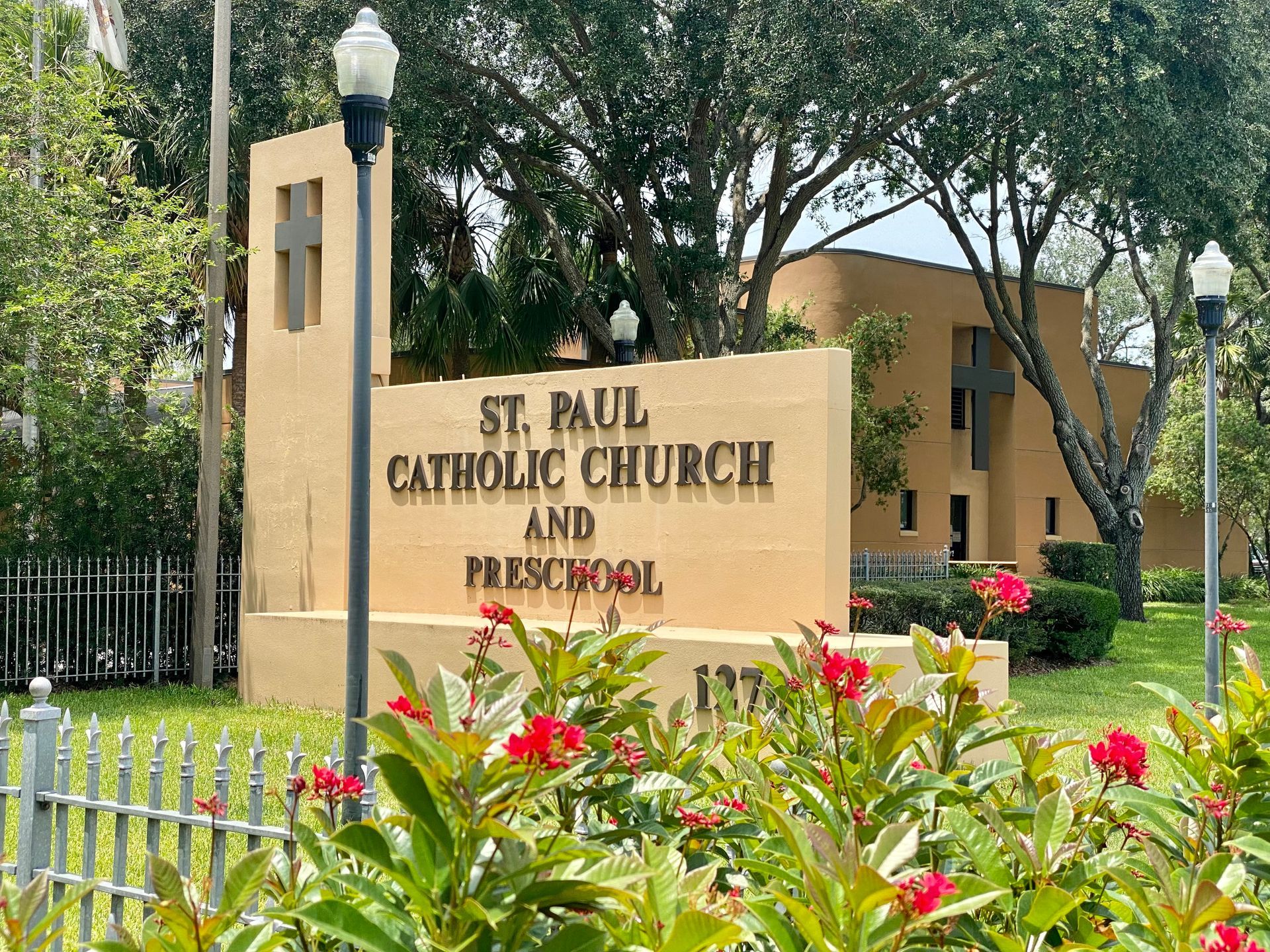 A sign for the st. paul catholic church and preschool