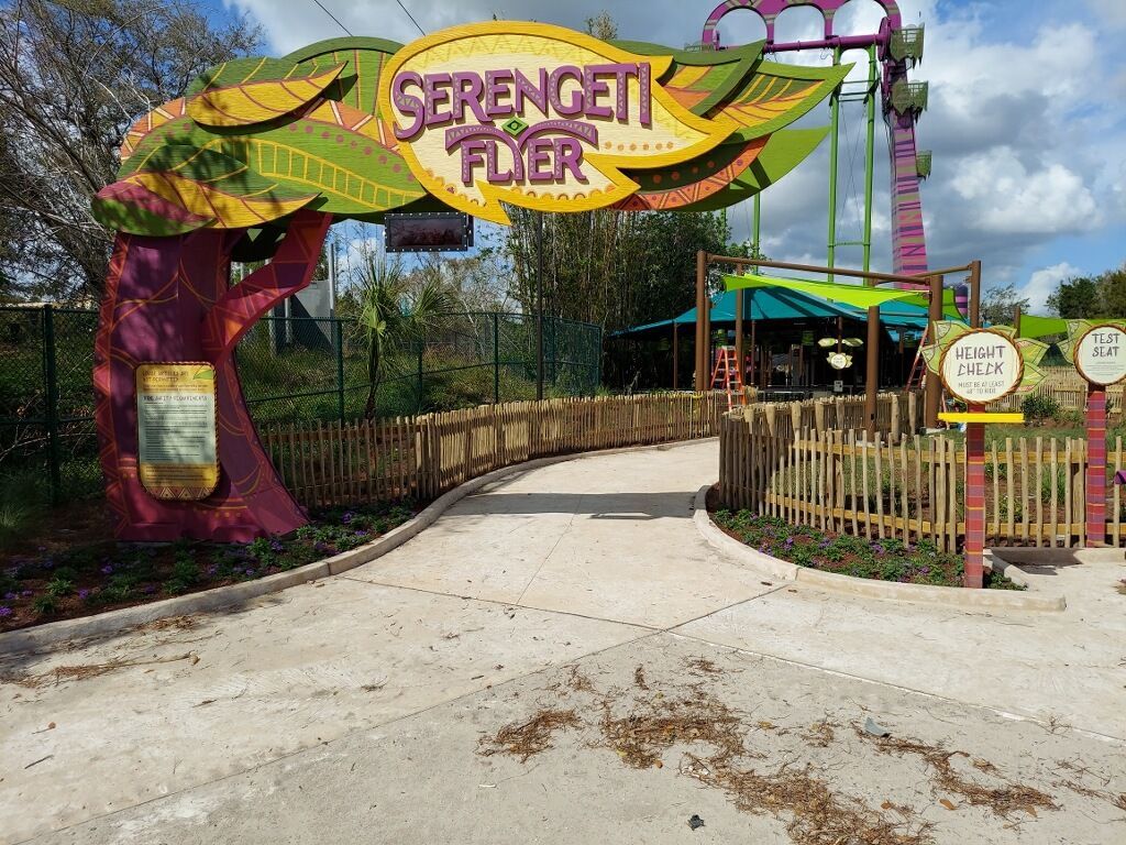 The serengeti flyer is a roller coaster at a theme park.