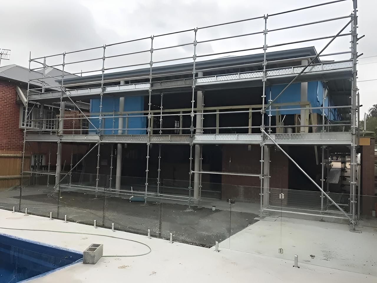 A Building Under Construction With Scaffolding Around — East Maitland Building In Tenambit, NSW