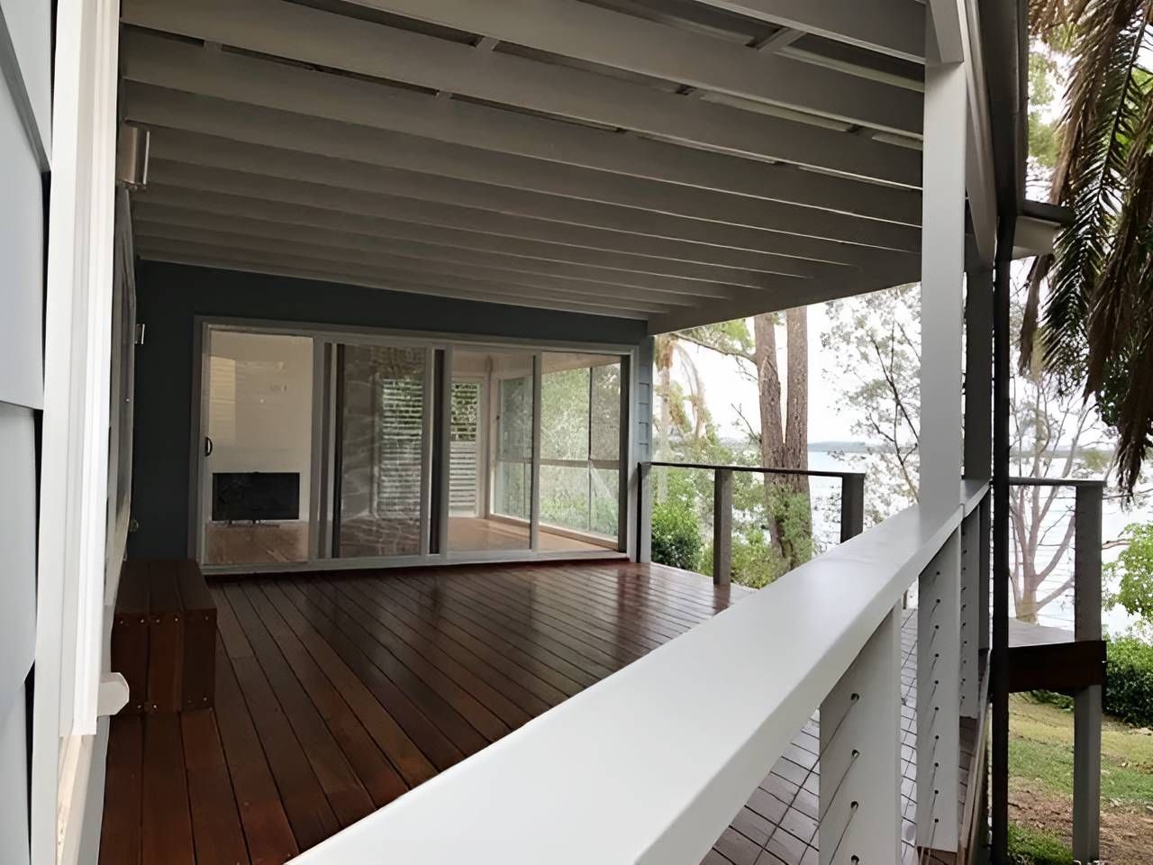 A Large Deck With a View of a Body of Water — East Maitland Building In Maitland, NSW