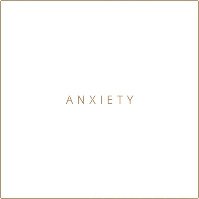 A white square with the word anxiety written on it.