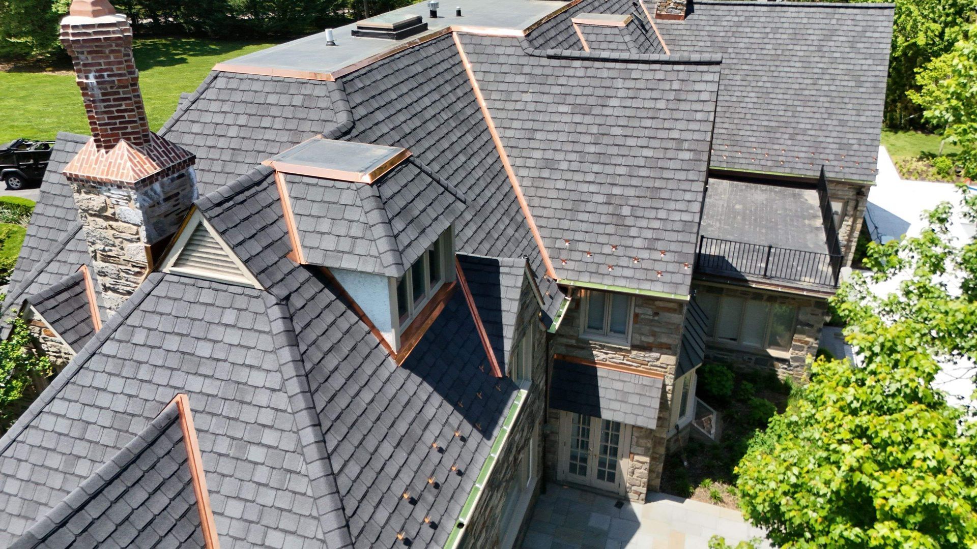 Photo of a roof repaired by Essential Exteriors.