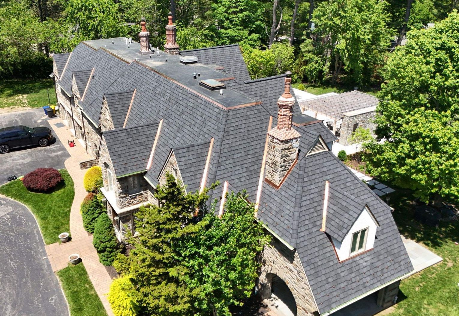 Photo of a new roof installed on a home by Essential Exteriors.