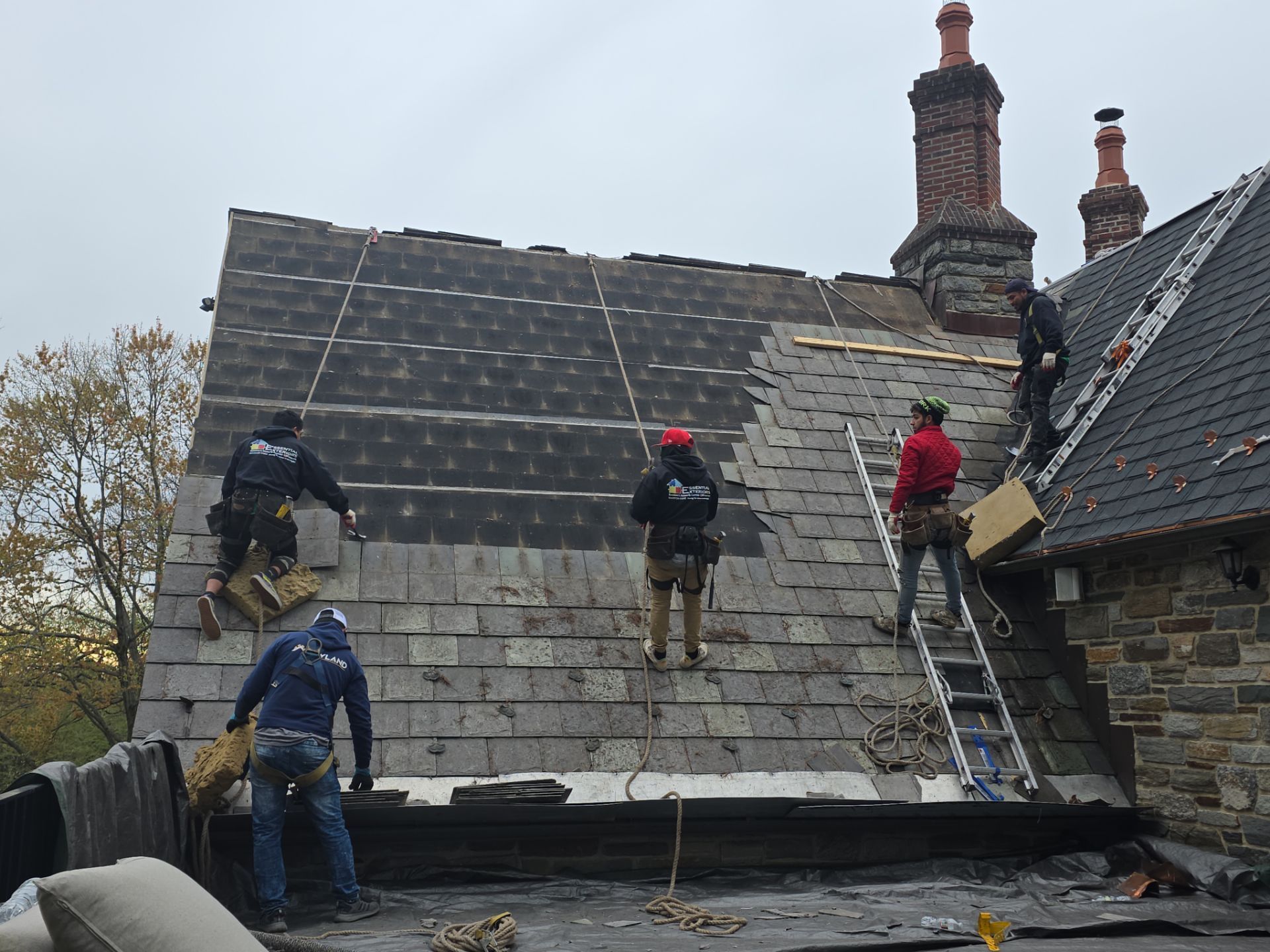 Aerial photo of house before roof replacement
