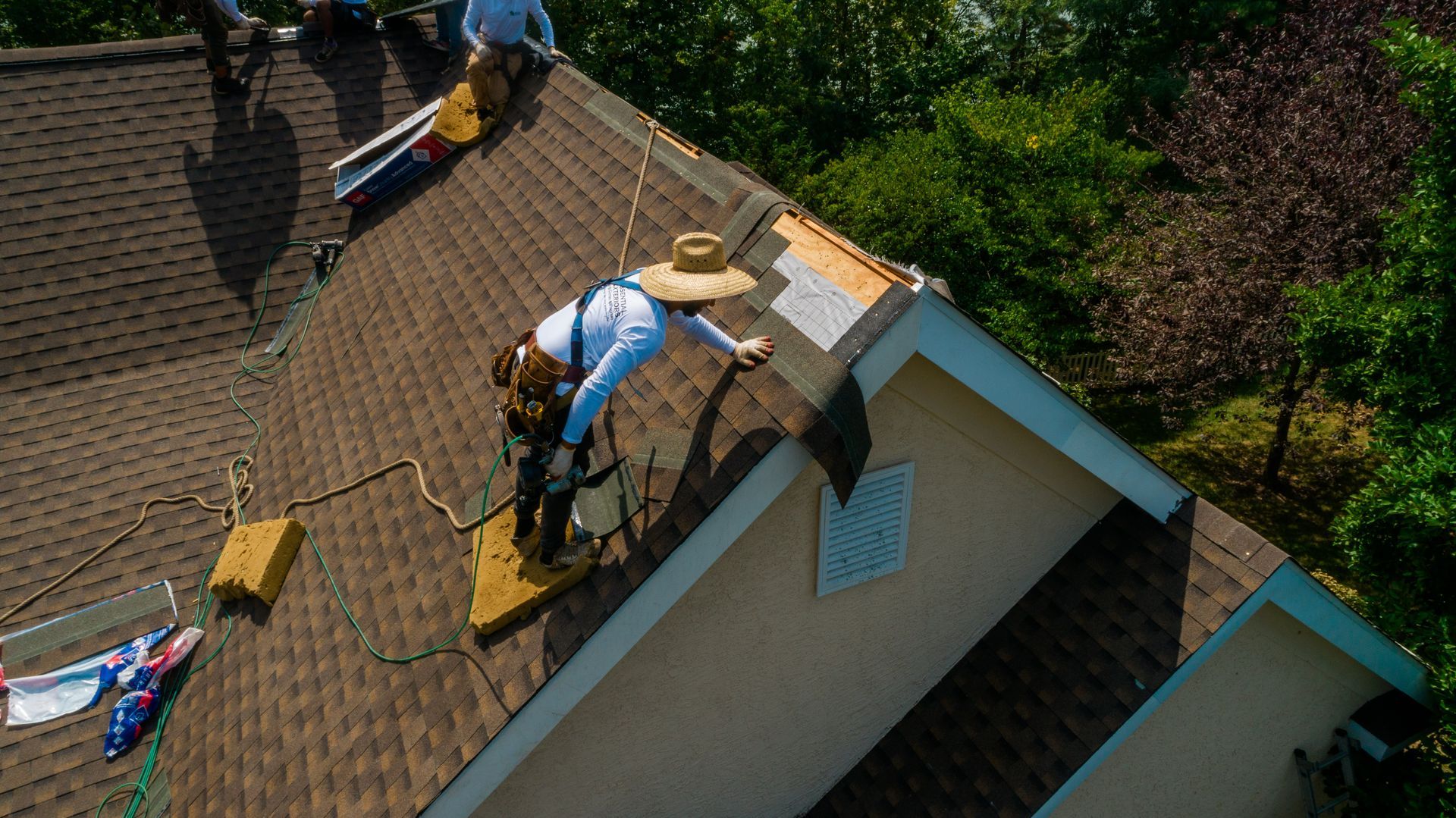 A aerial photo of a new roof being installed on a house