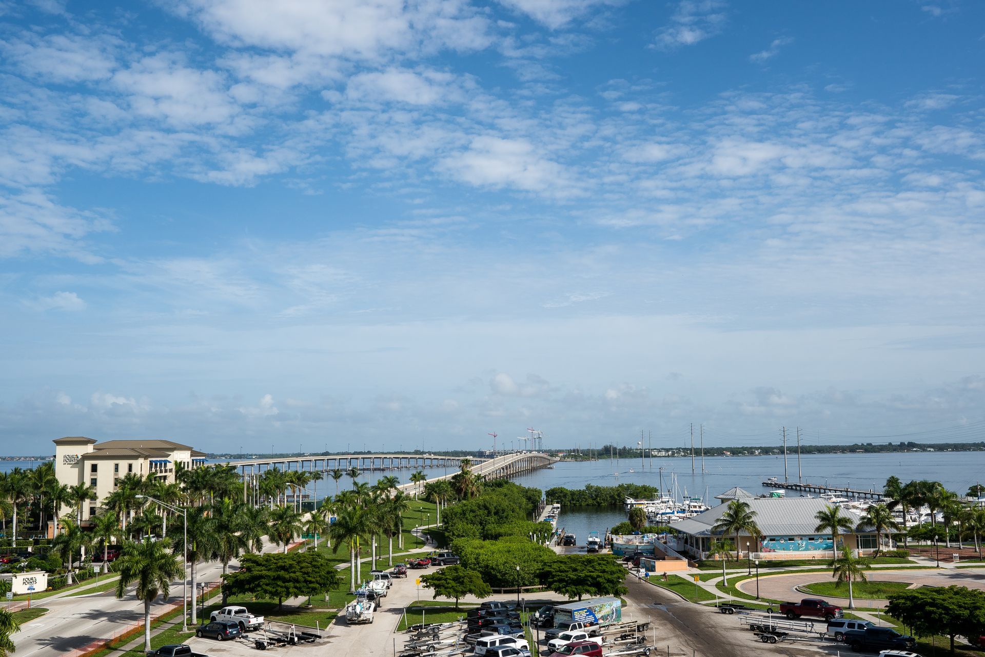An aerial view of a city next to a body of water.