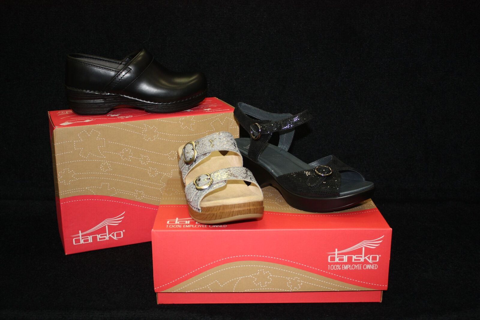 A pair of shoes is sitting on top of a box.