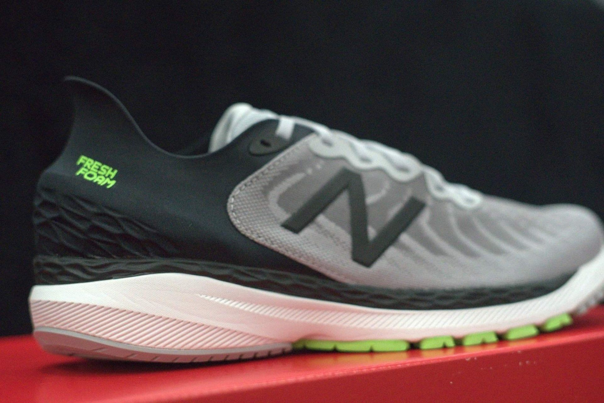 A pair of new balance fresh foam 1080v9 running shoes