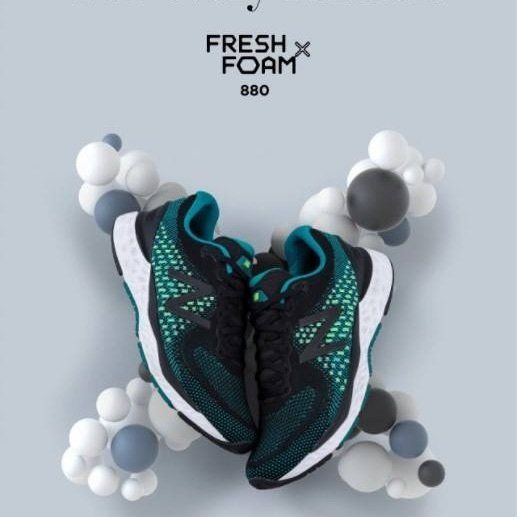 A pair of fresh foam 880 shoes surrounded by bubbles