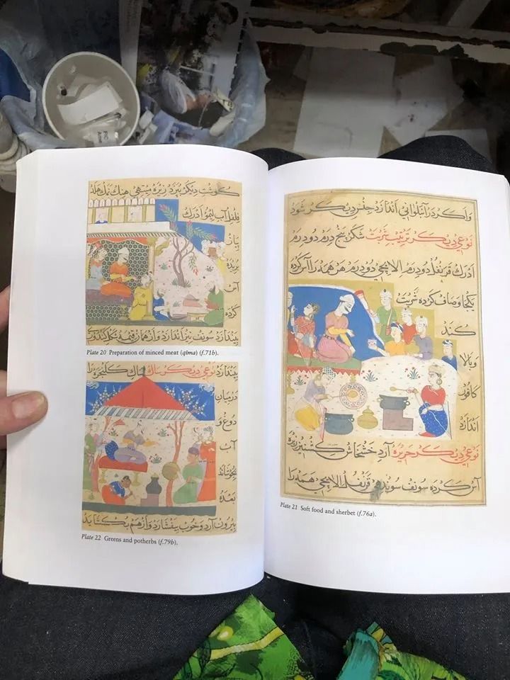 Open book with colorful Persian miniature paintings. Figures in detailed scenes, surrounded by Arabic script.