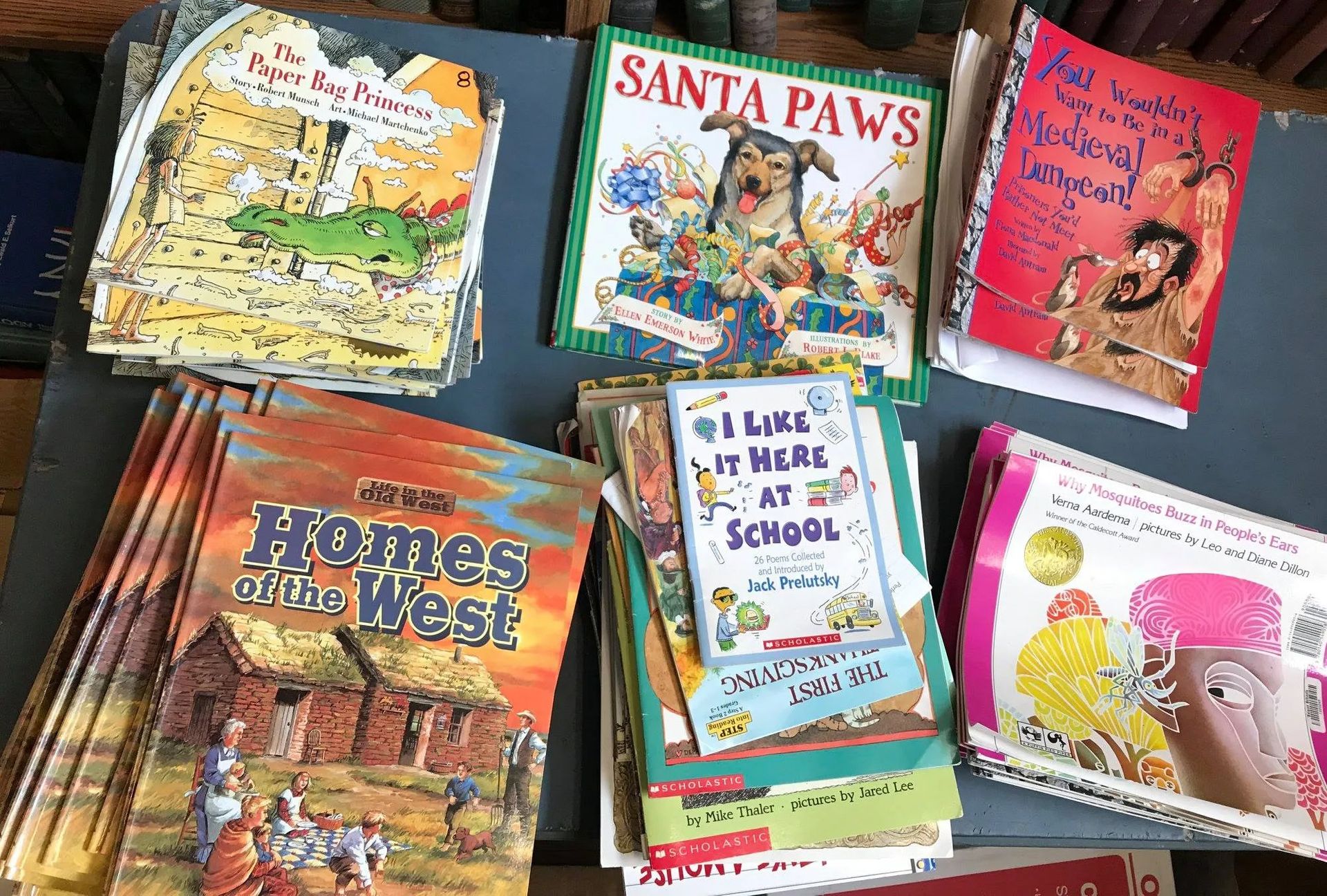 Books stacked on a surface, including 