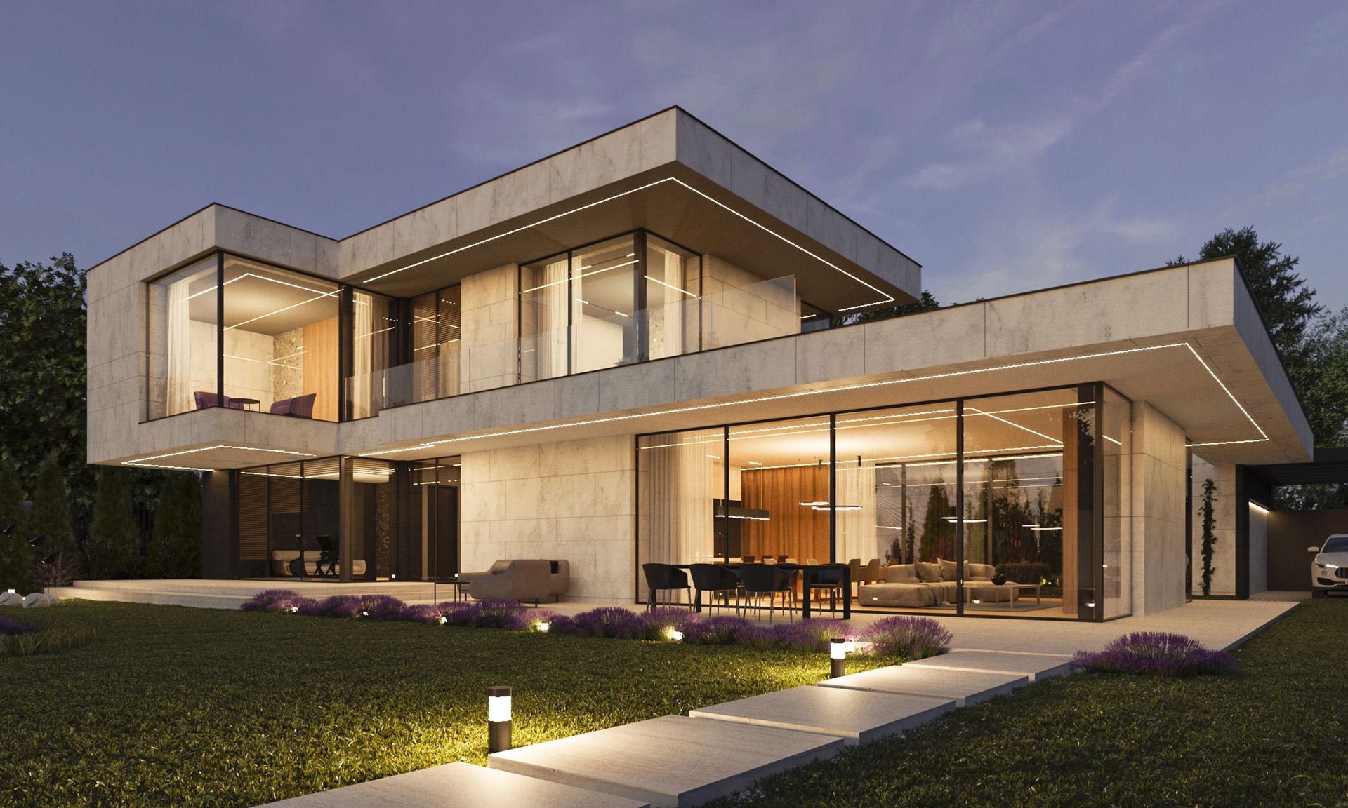 Modern two-story house with large windows and a flat roof. Landscaped lawn and evening lighting.