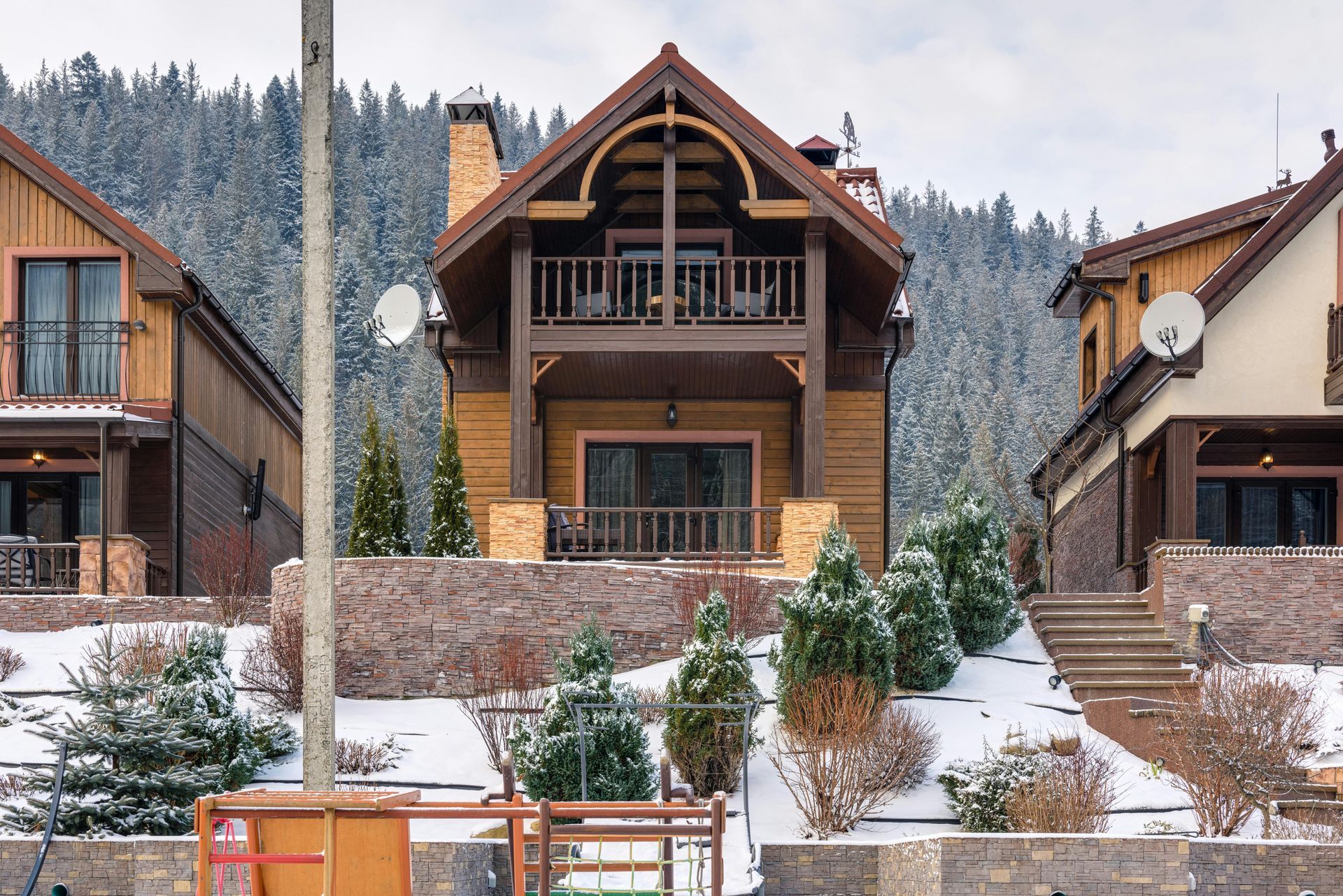 A house with a satellite dish on the top of it
