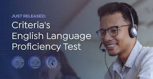 Man working in call centre wearing headphones.