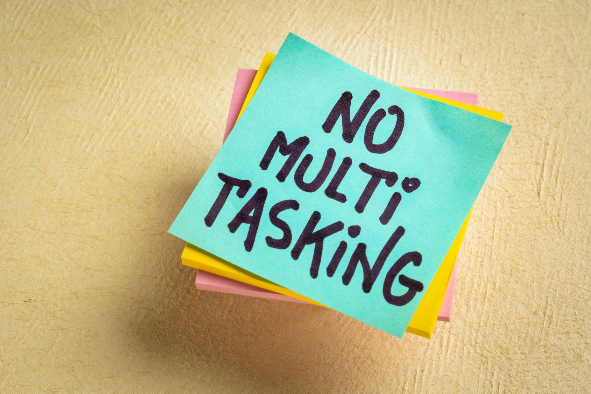 A post it note with the words 