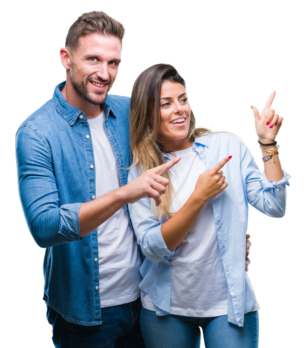 Couple, smiling and pointing upwards with fingers, wearing casual blue shirts.