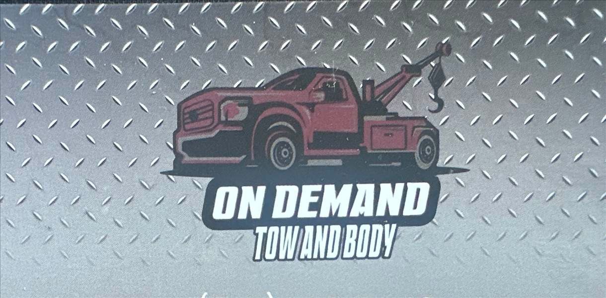 Logo of "On Demand Tow and Body" with a red tow truck on diamond-plate background.