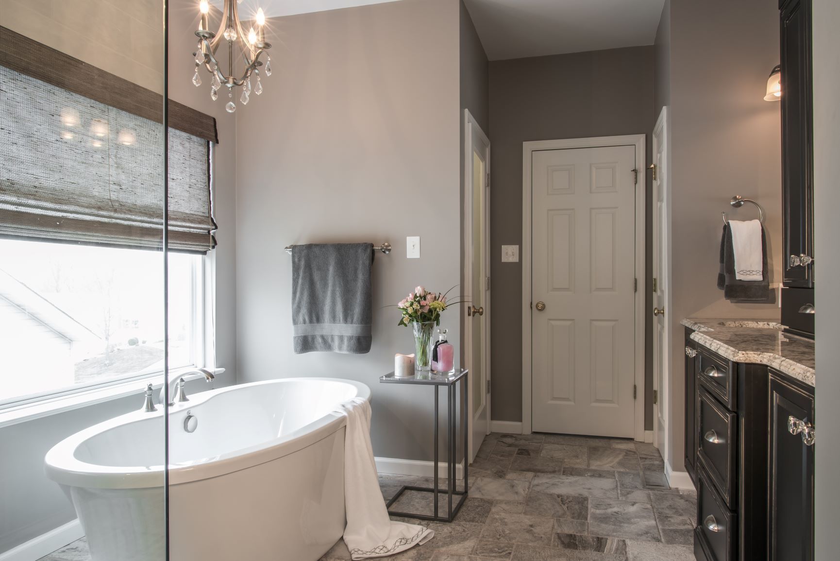 A living room filled with furniture and a fireplace.