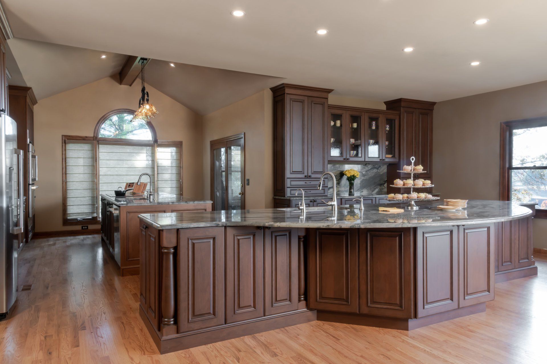 There is a large island in the middle of the kitchen.