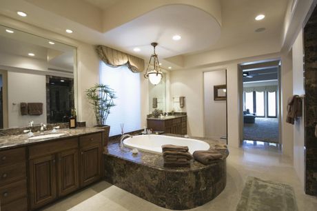 bathroom with marble tub