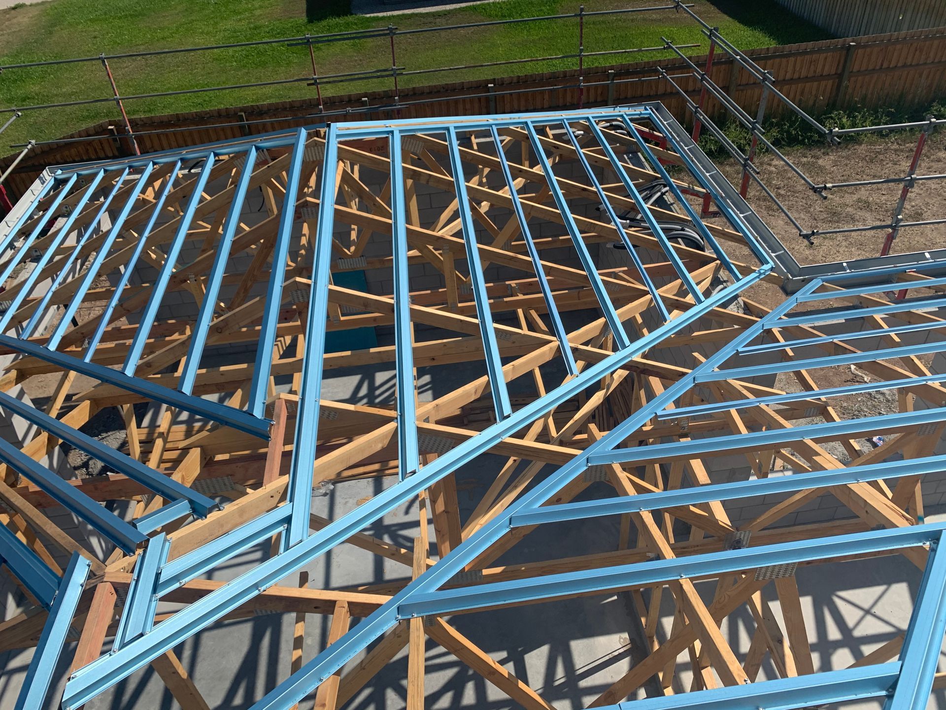 White metal roof with mountains in the background.— Roof 4 U in Rasmussen, QLD