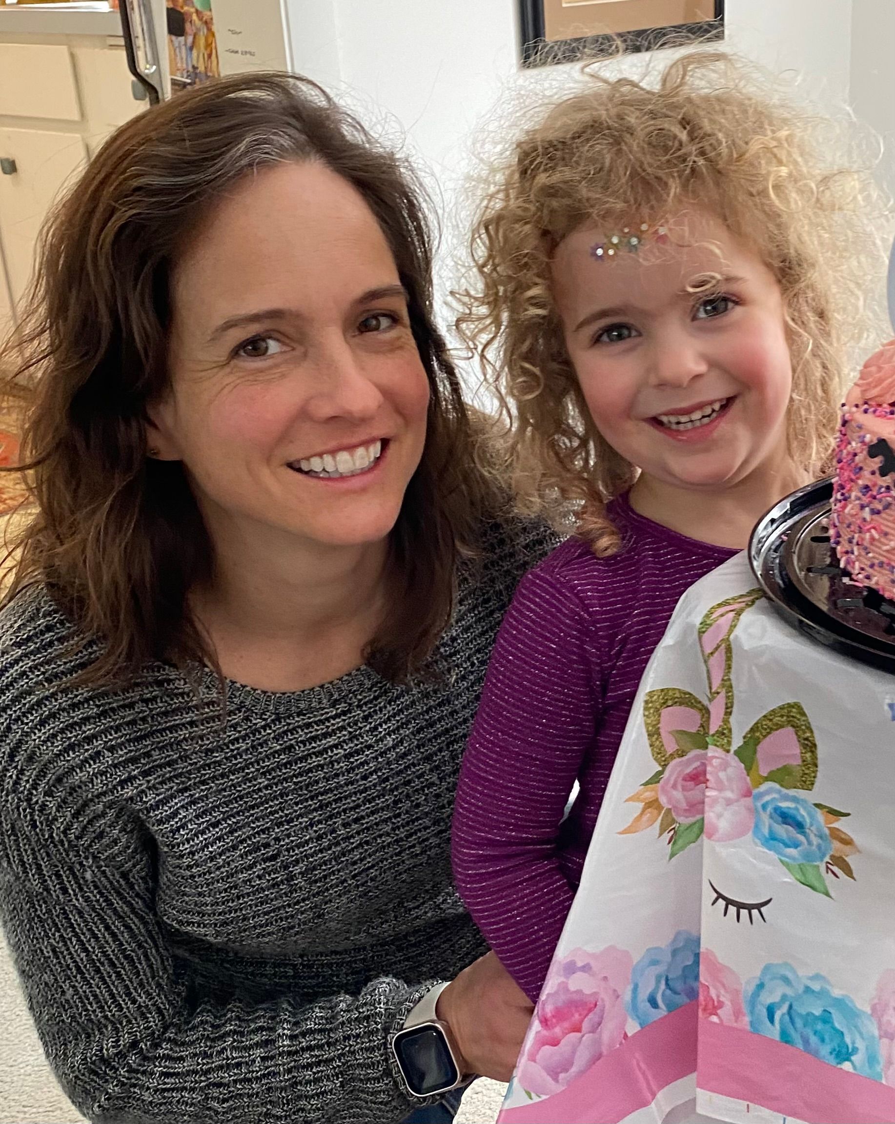 Ali Teacher with child