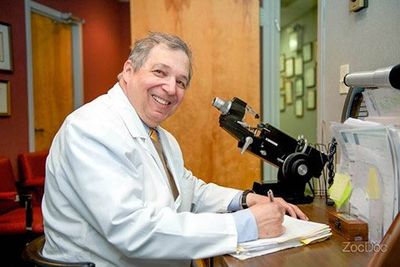 Dr. Goldfarb at a Microscope - Advanced Eye Care in River Edge, NJ
