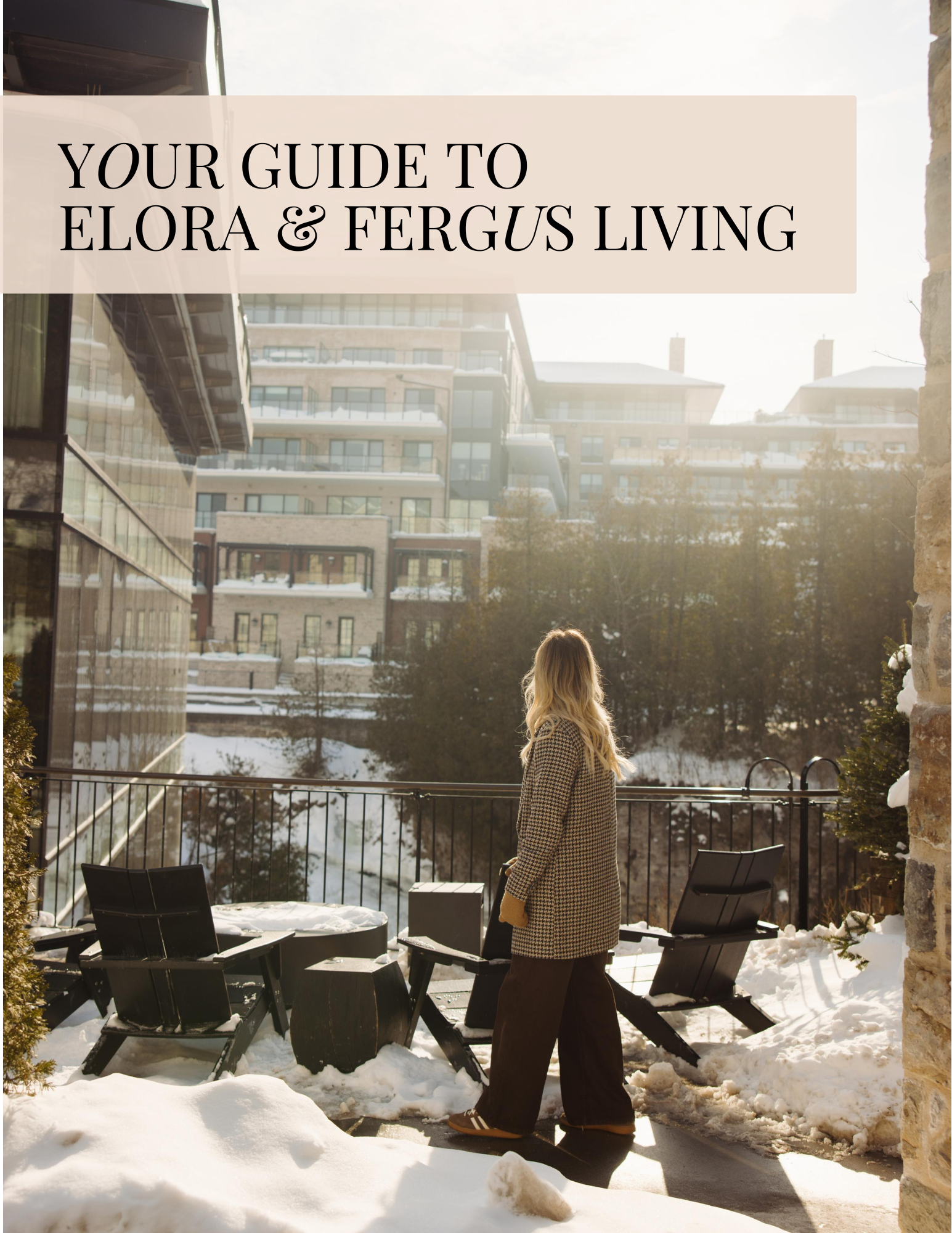 A woman is sitting at a table using a laptop computer.