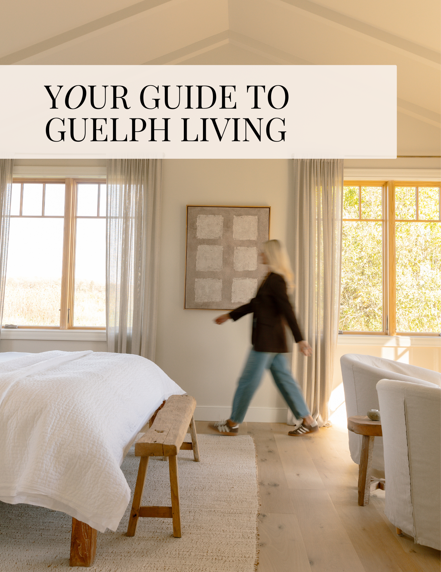 A person is sitting at a table using a laptop computer.