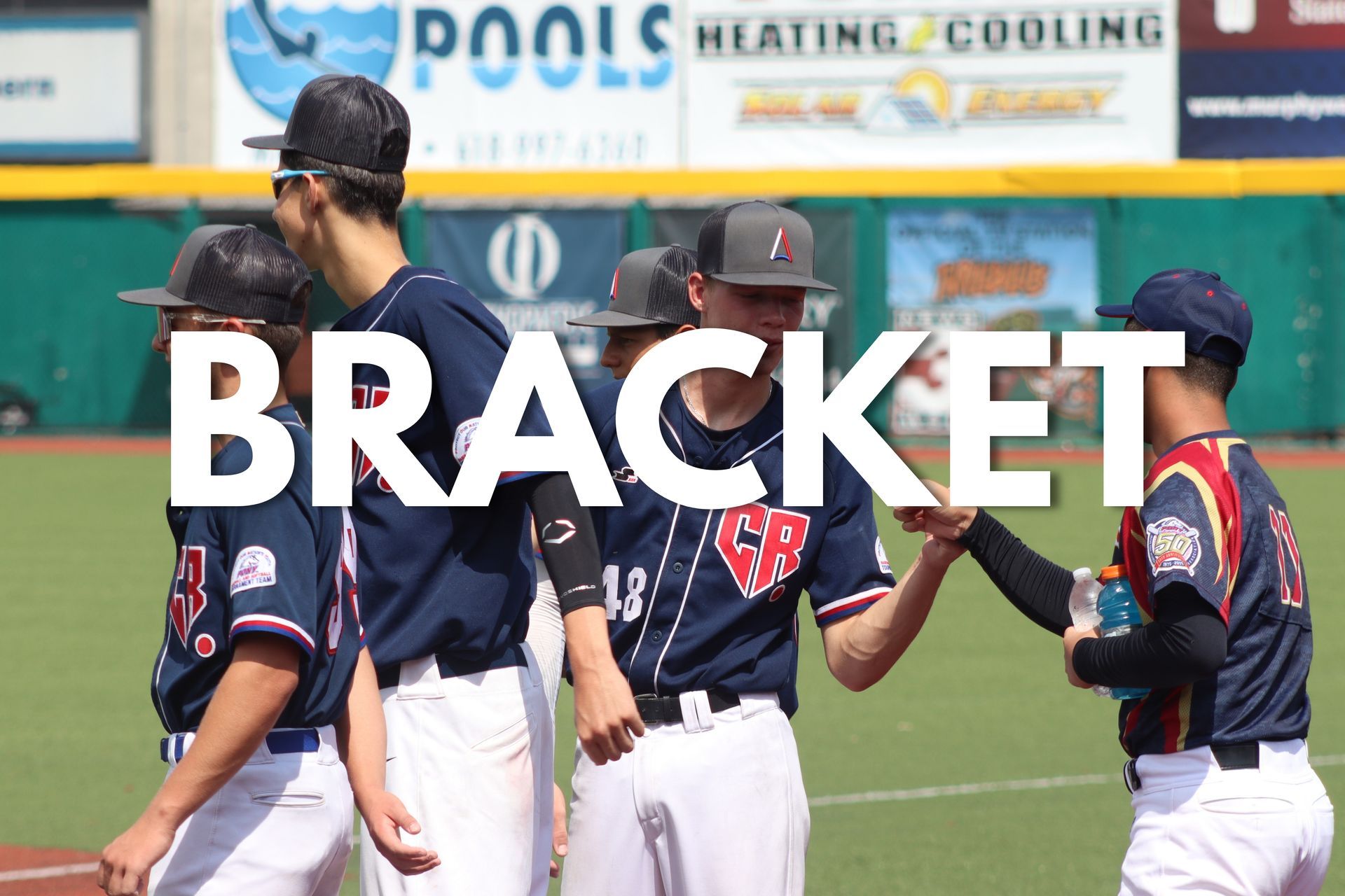 Baseball players in navy uniforms huddle on the field with large “BRACKET” text overlaid.