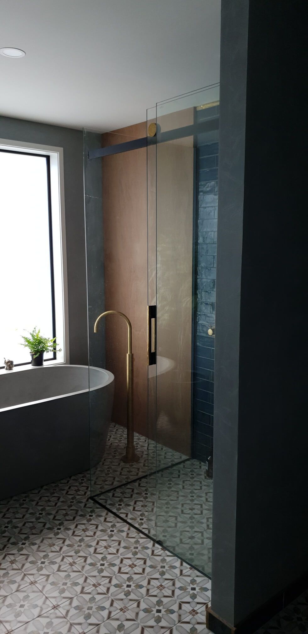 chic bathroom with cement tub