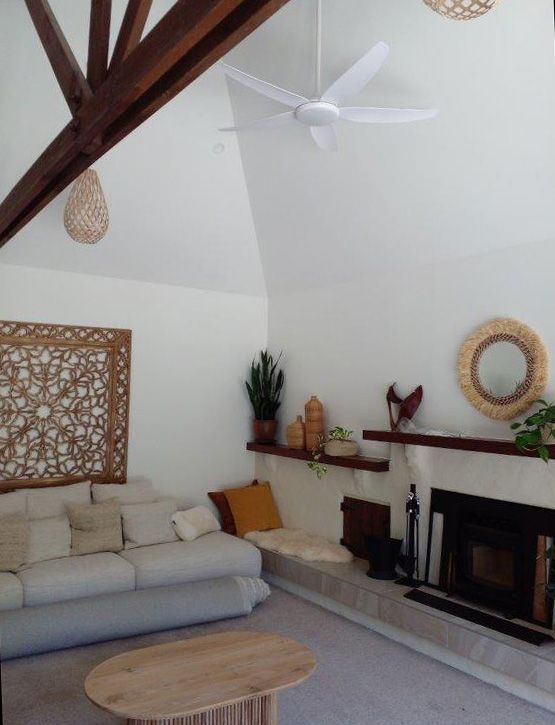 open plan living area with beams