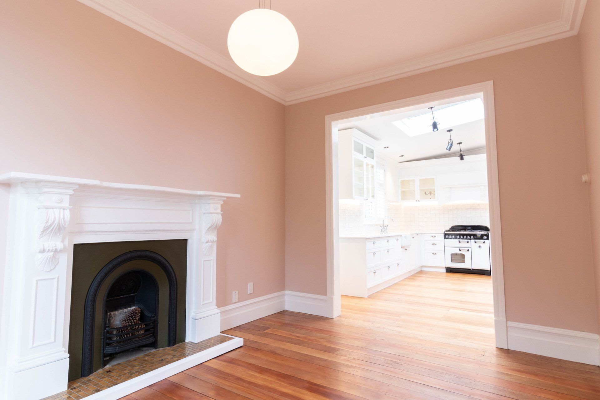 There is a fireplace in the middle of the room.