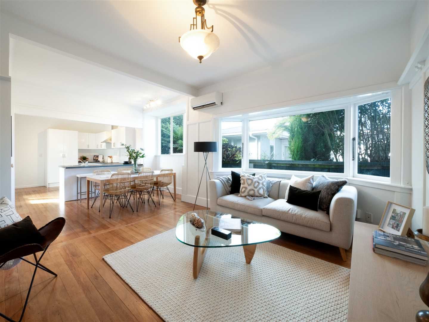 A living room with a couch and a coffee table