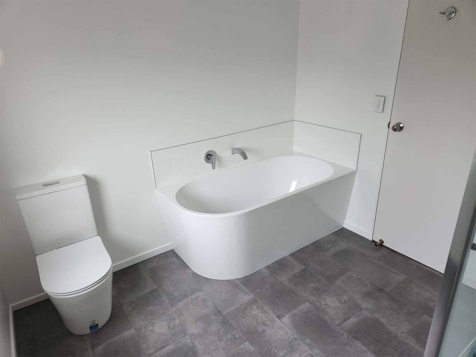 back to wall bath tub