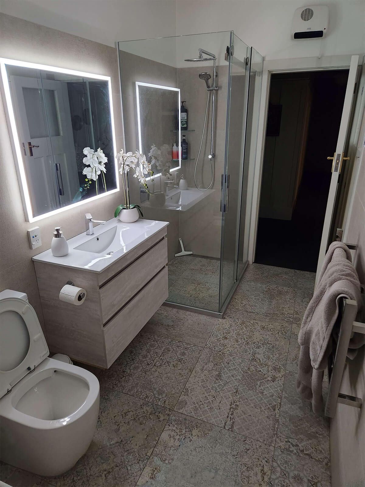 elegant bathroom with integrated lighting