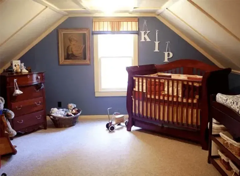 A baby room with a crib and a dresser